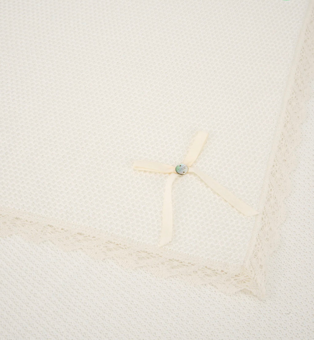 PAZ RODRIGUEZ: “PAZ V25” Cream Baby Blanket With Lace