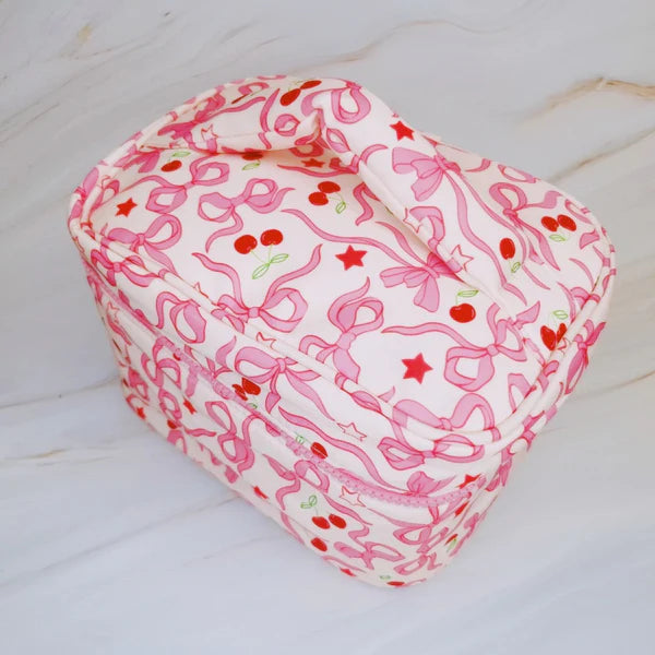 ELLISON+YOUNG: CHERRY BOWTIFUL TRAVEL COSMETIC CASE WITH HANDLE