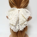 Floral lace drape bow