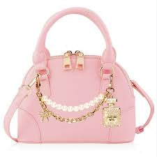 CARRYING KIND: CHARLOTTE PETAL PINK
